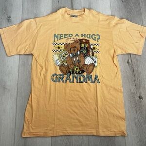 Vintage 90’s Oneita Orange Graphic T-Shirt with Bear Print